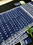 Deep blue jandani saree with white threads all over work.