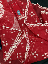 Radish Maroon cotton jamdani saree with white threads work all over work.