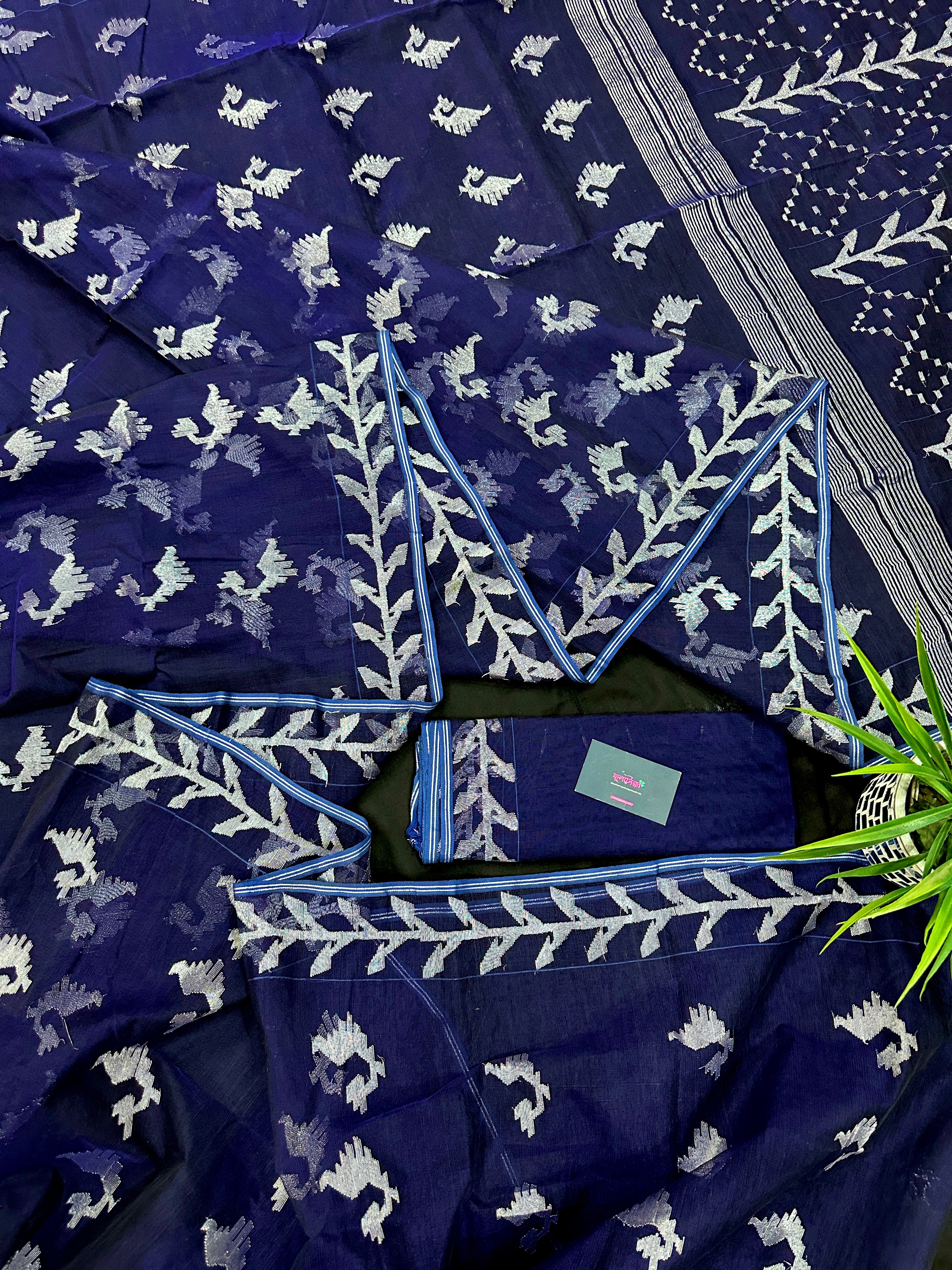 Navy blue jamdani saree with silver jori work soft threads all over work.