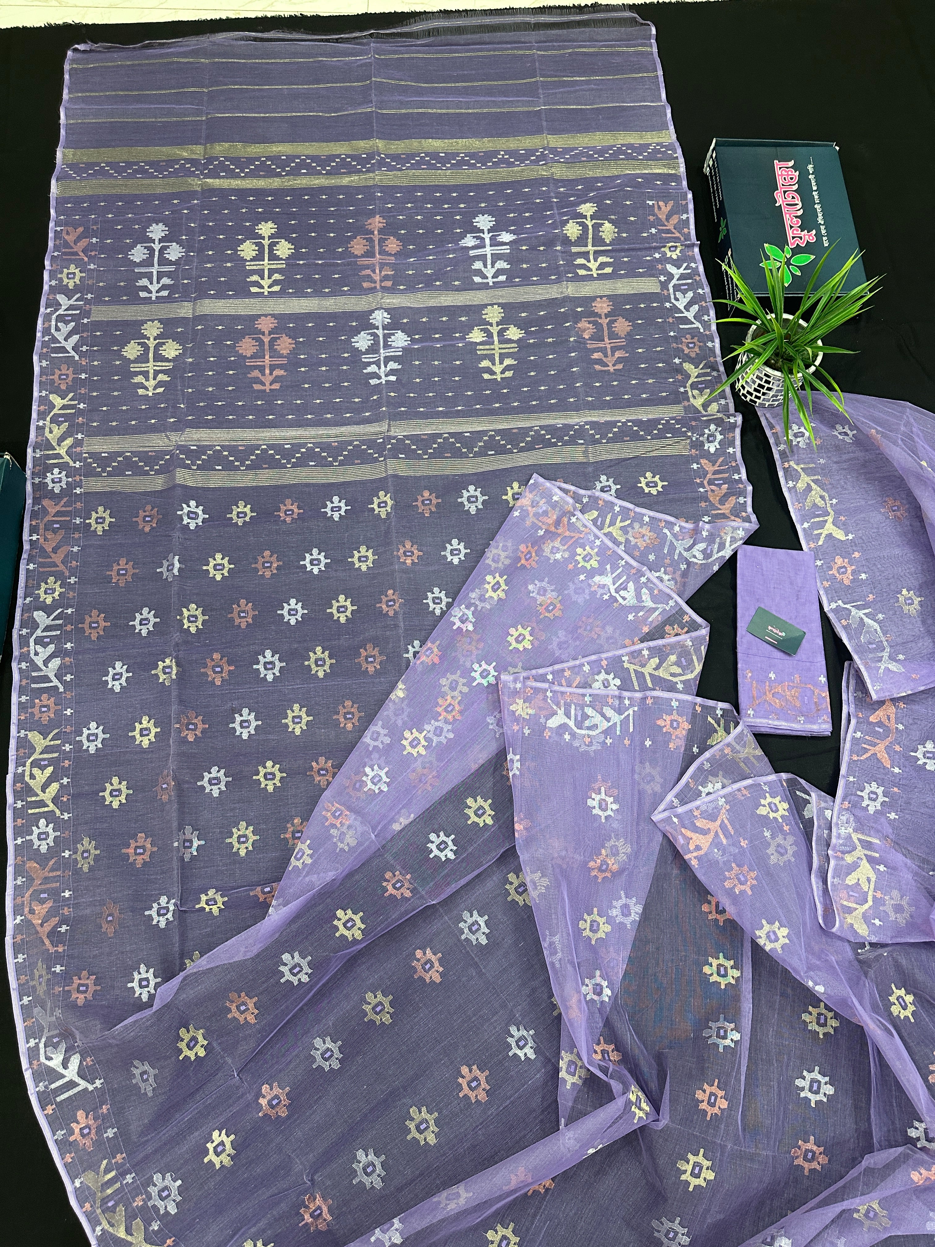 Lite lavender jamdani saree with golden silver copper jori work.