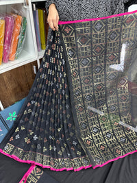 Black jamdani saree with golden silver and copper jori work and pink border