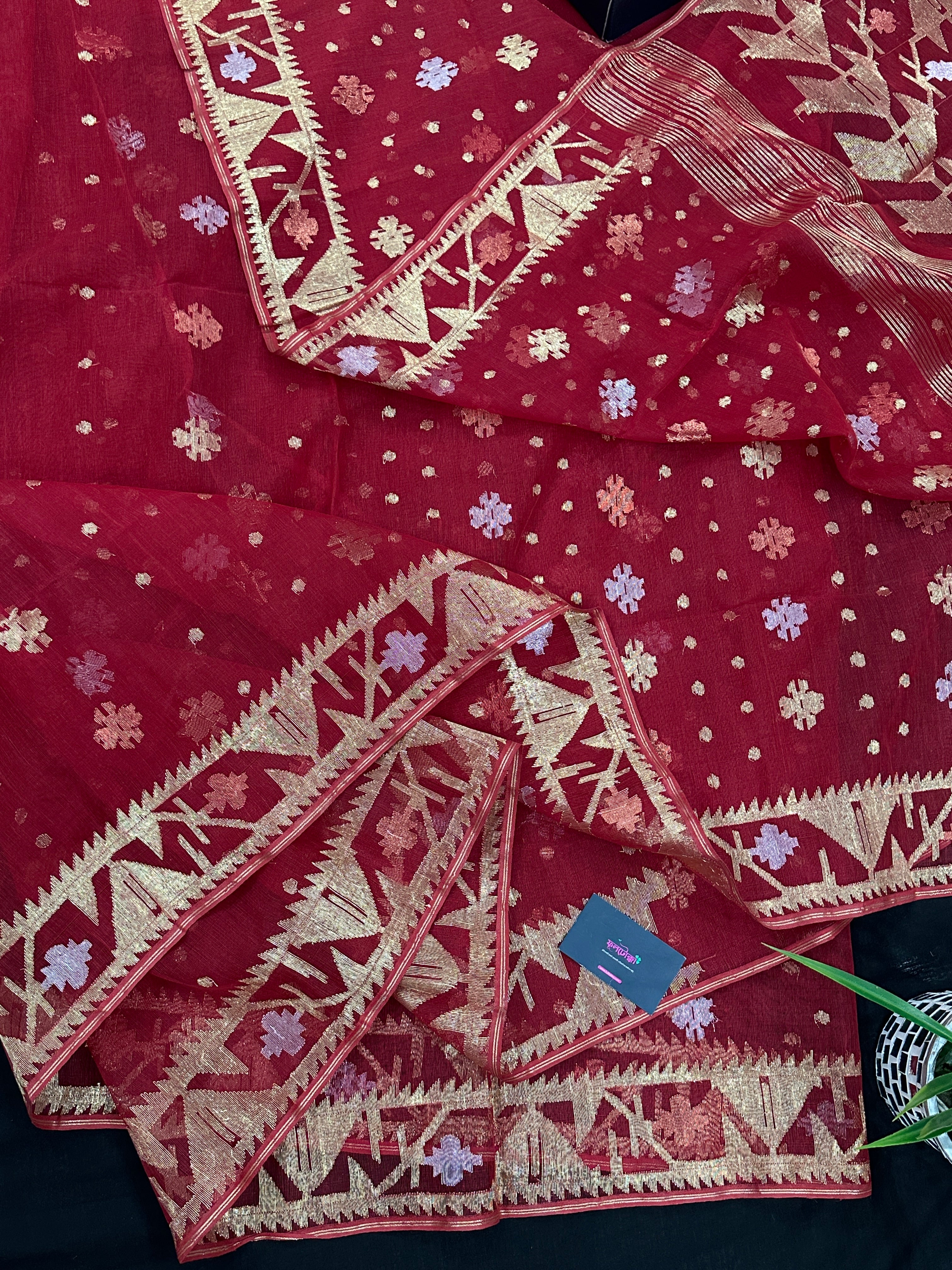 Red jamdani saree with golden jori all over work with blouse piece.