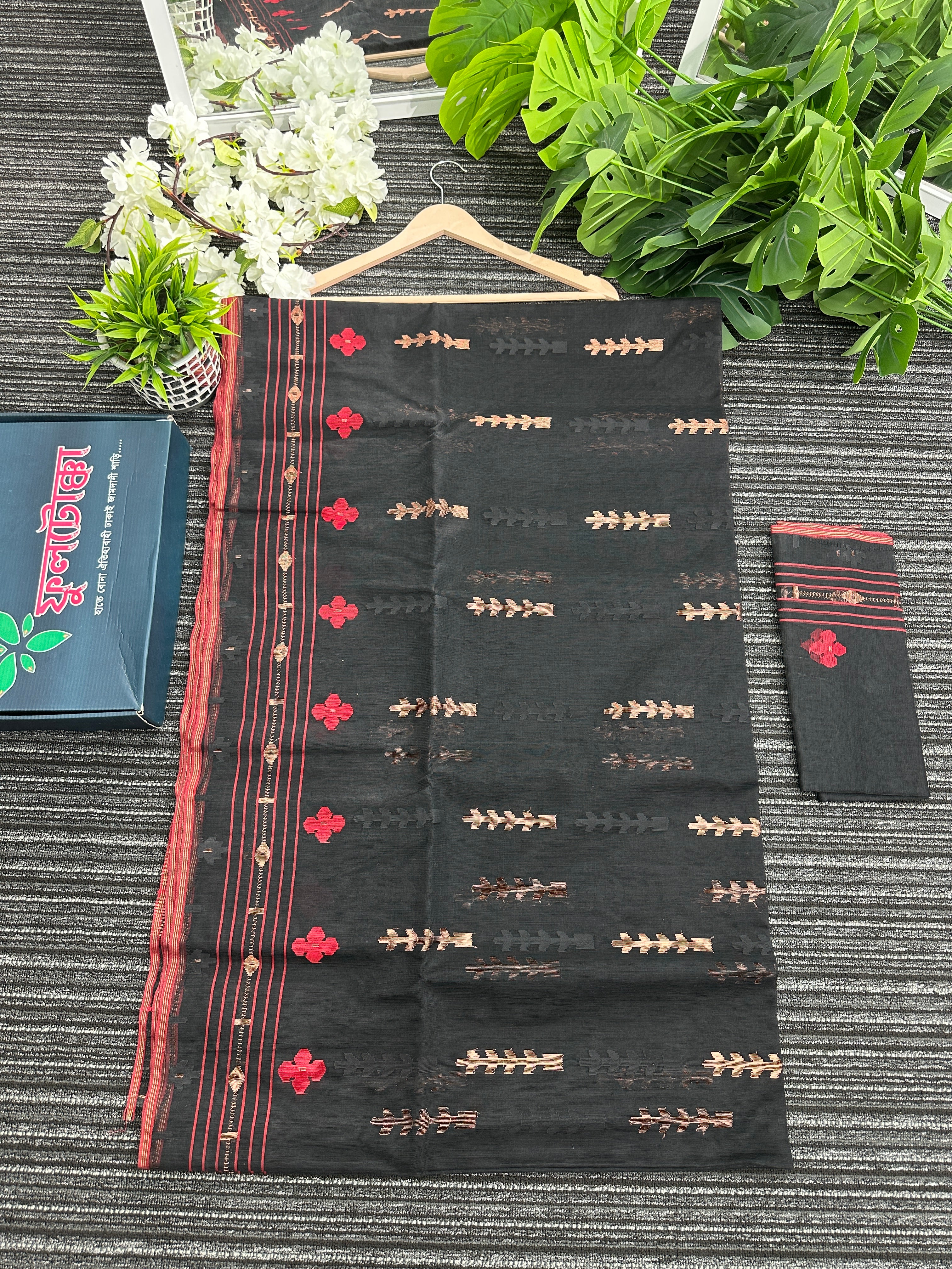 Black halfsilk jamdani saree with red paar and copper jori work