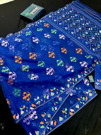 Royal blue jamdani saree with green pink blue orange threads work.