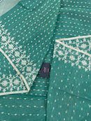 Mint cotton jamdani saree with white threads work all over work and blouse piece.