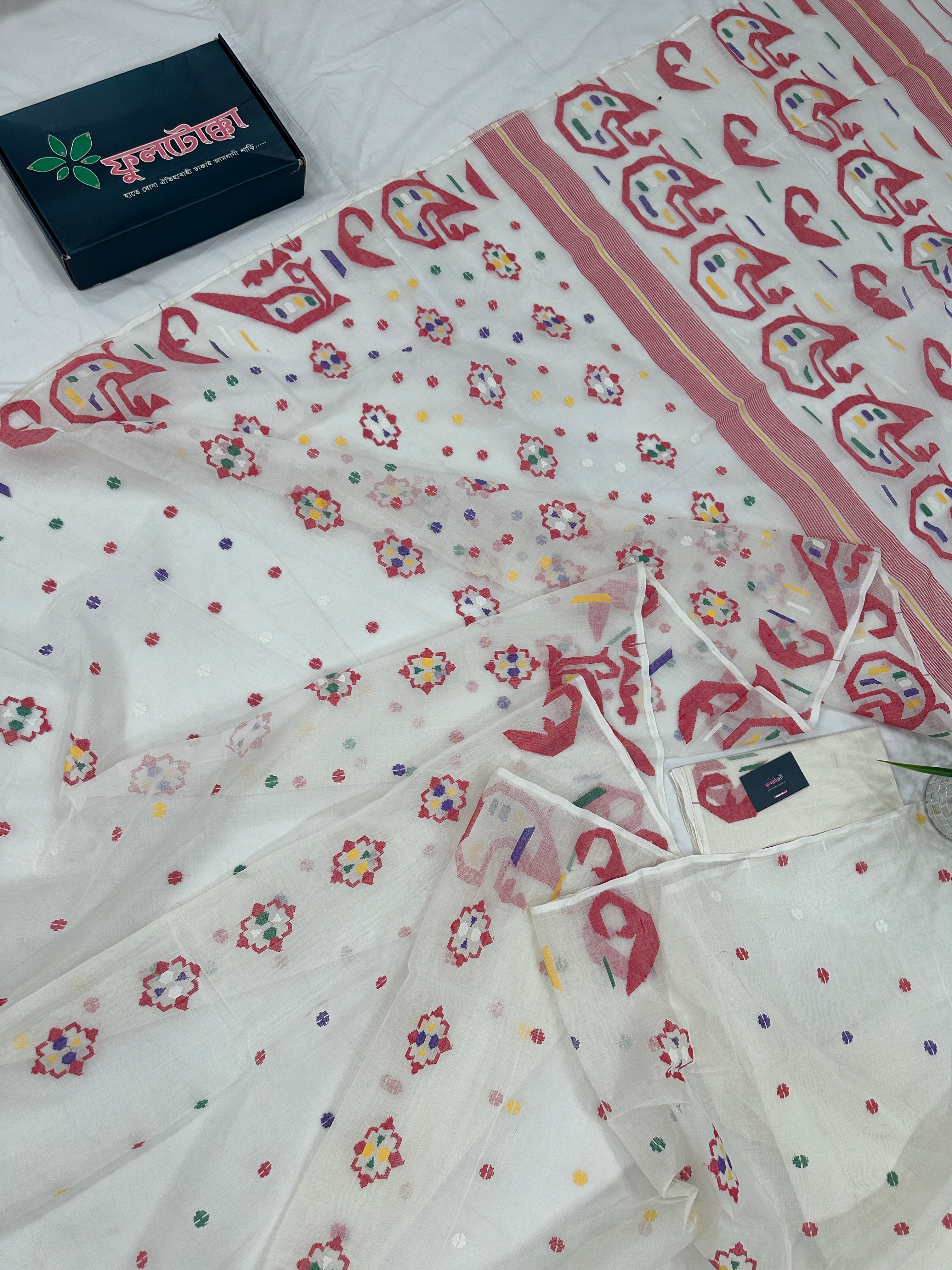 White cotton jamdani saree with multiple colour threads work and blouse piece.