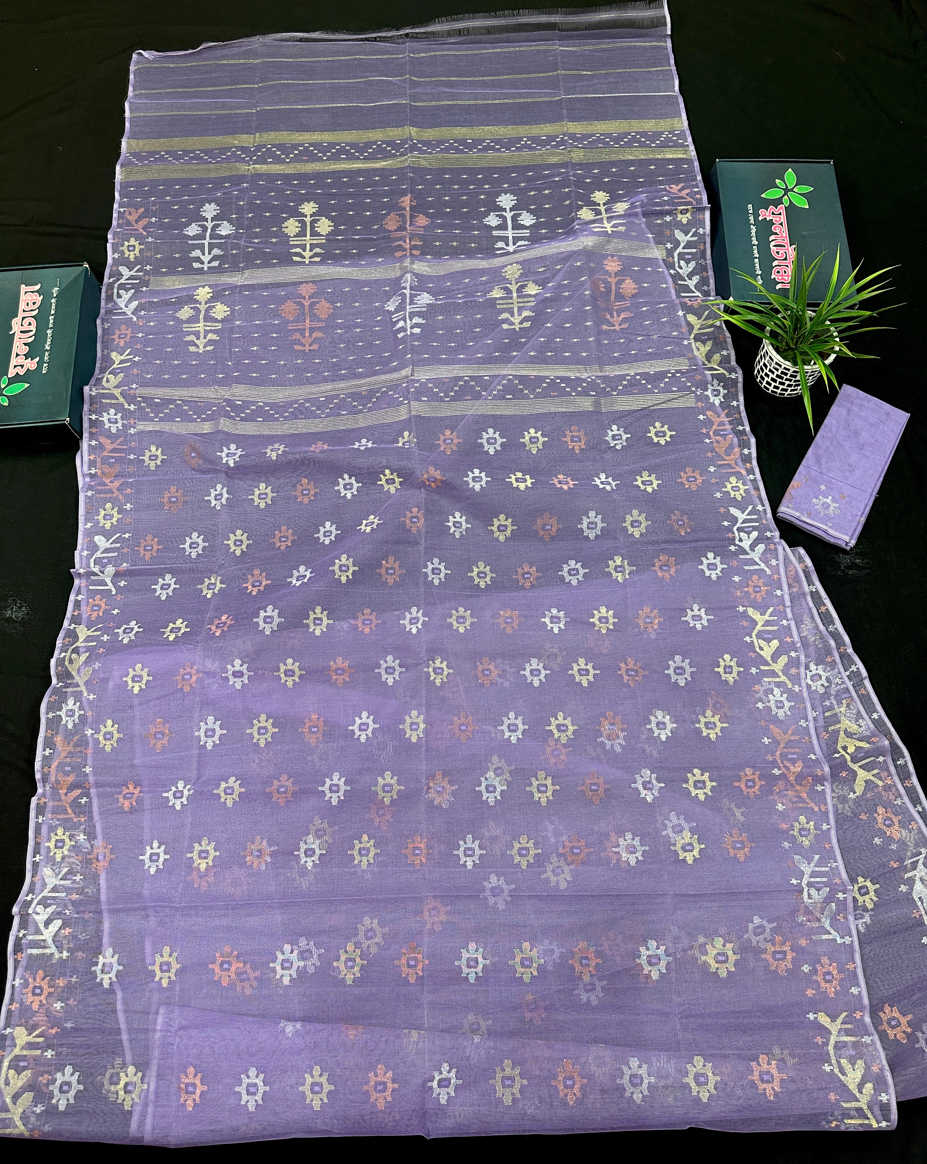 Lite lavender jamdani saree with golden silver copper jori work.