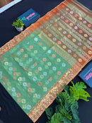 Pastel green halfsilk jamdani saree with golden brown contrast and golden silver copper jori work