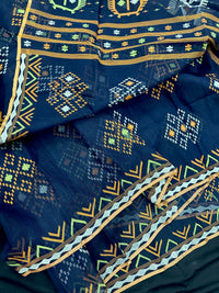 Navy blue jamdani saree with orange  green & off white threads work.