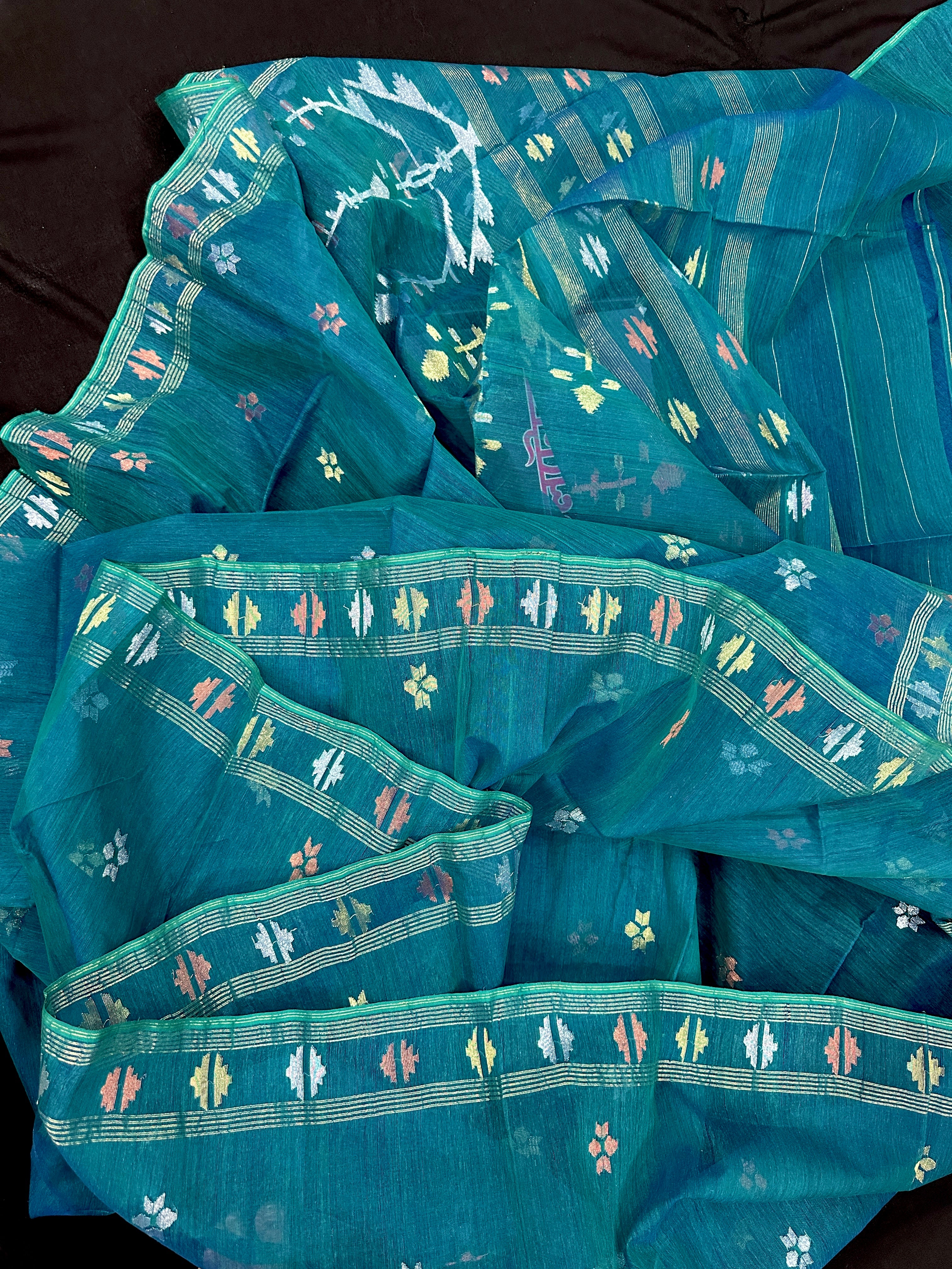 Sea green budget range jamdani saree with golden silver & copper jori work.