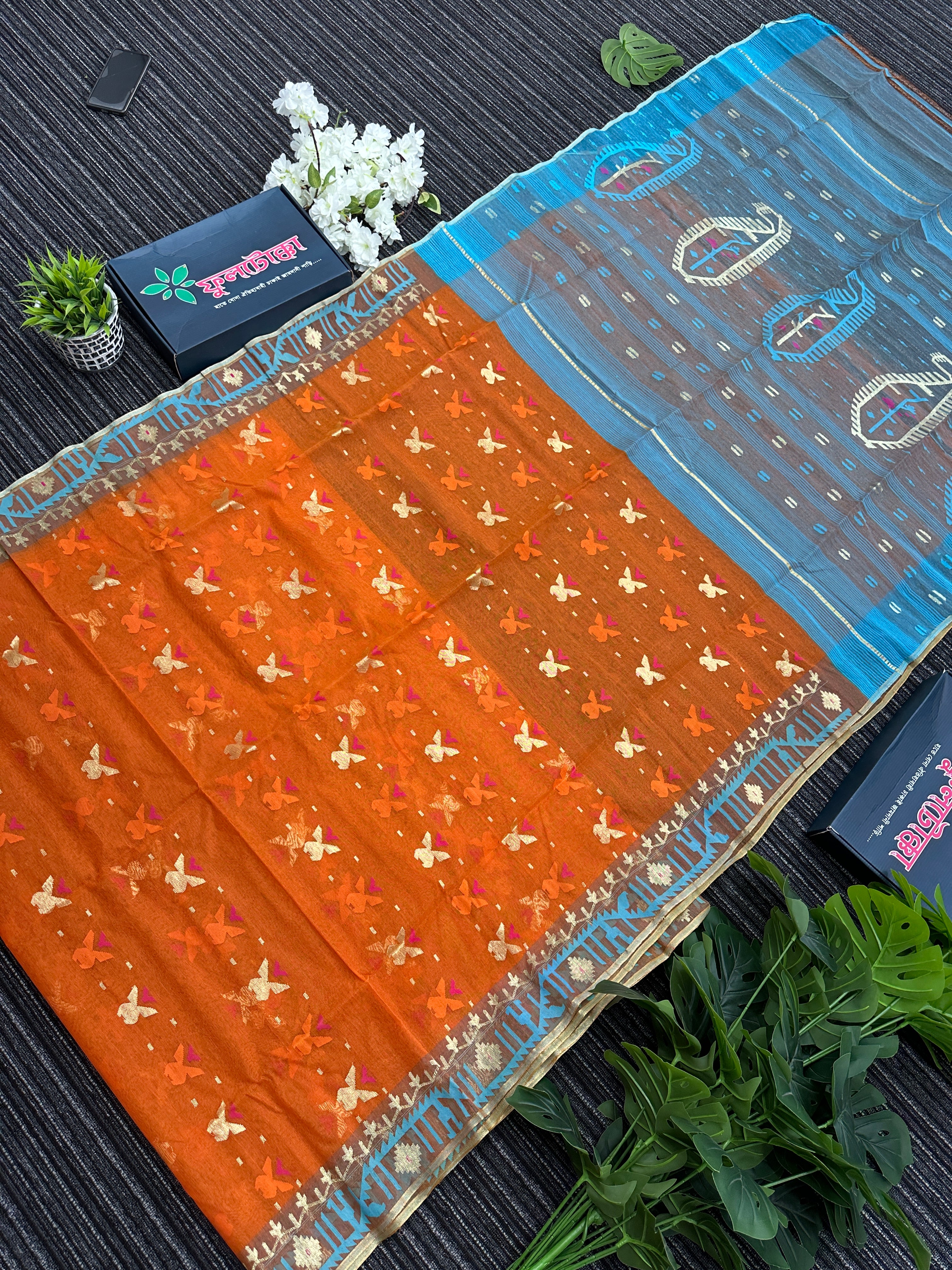 Fanta orange halfsilk jamdani saree with golden jori work and blue orange threads work