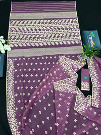 Onion cotton jamdani saree with yellowish threads work all over work.