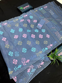 Powdery blue jamdani saree with pink blue and golden jori work.