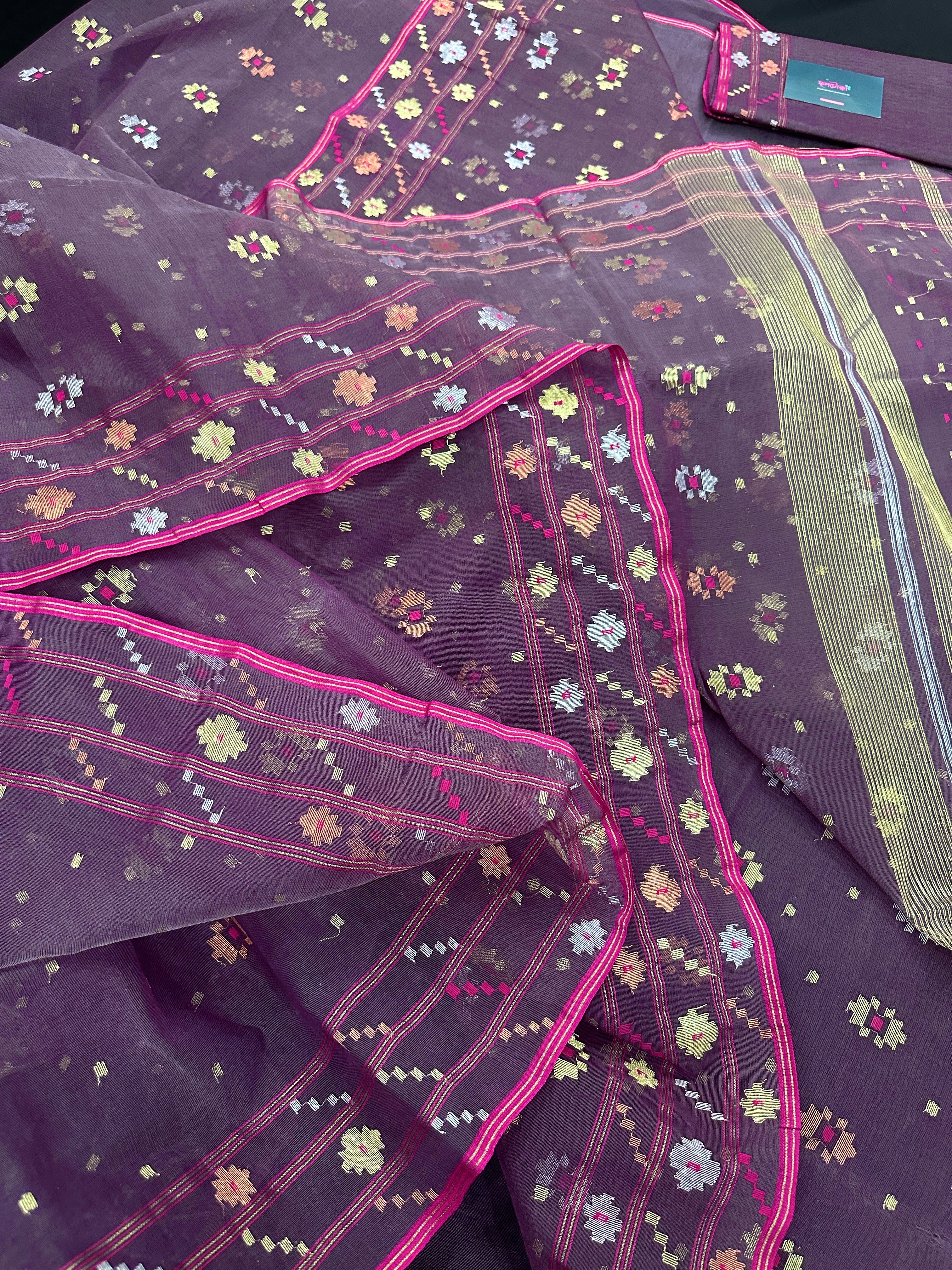 Deep bitrut dual toned jamdani saree with golden silver & copper jori work.