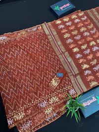 Brown reshom halfsilk jamdani saree with golden silver & copper jori work.
