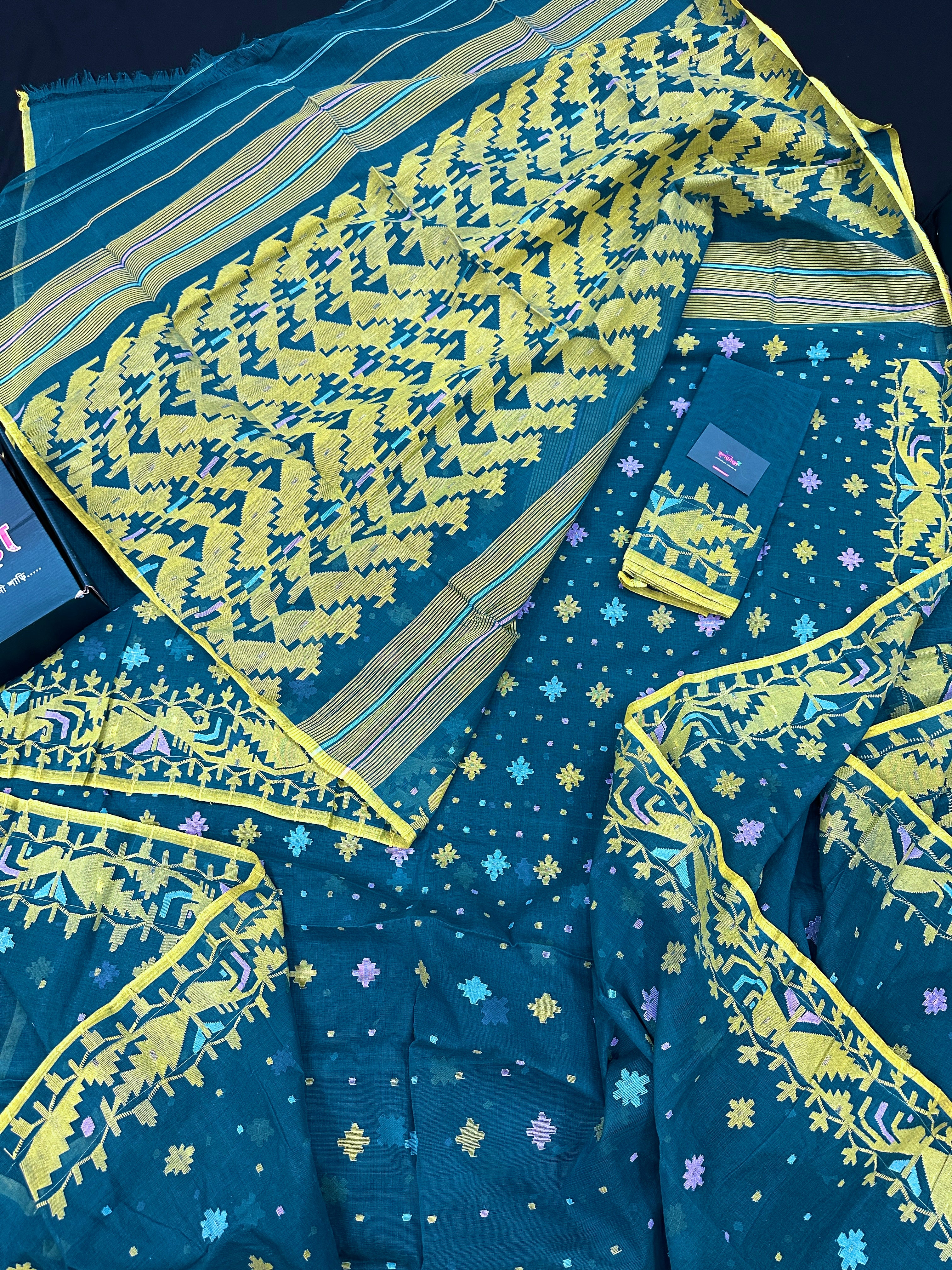 Peacock blue cotton jamdani saree with yellow threads work all over soft count