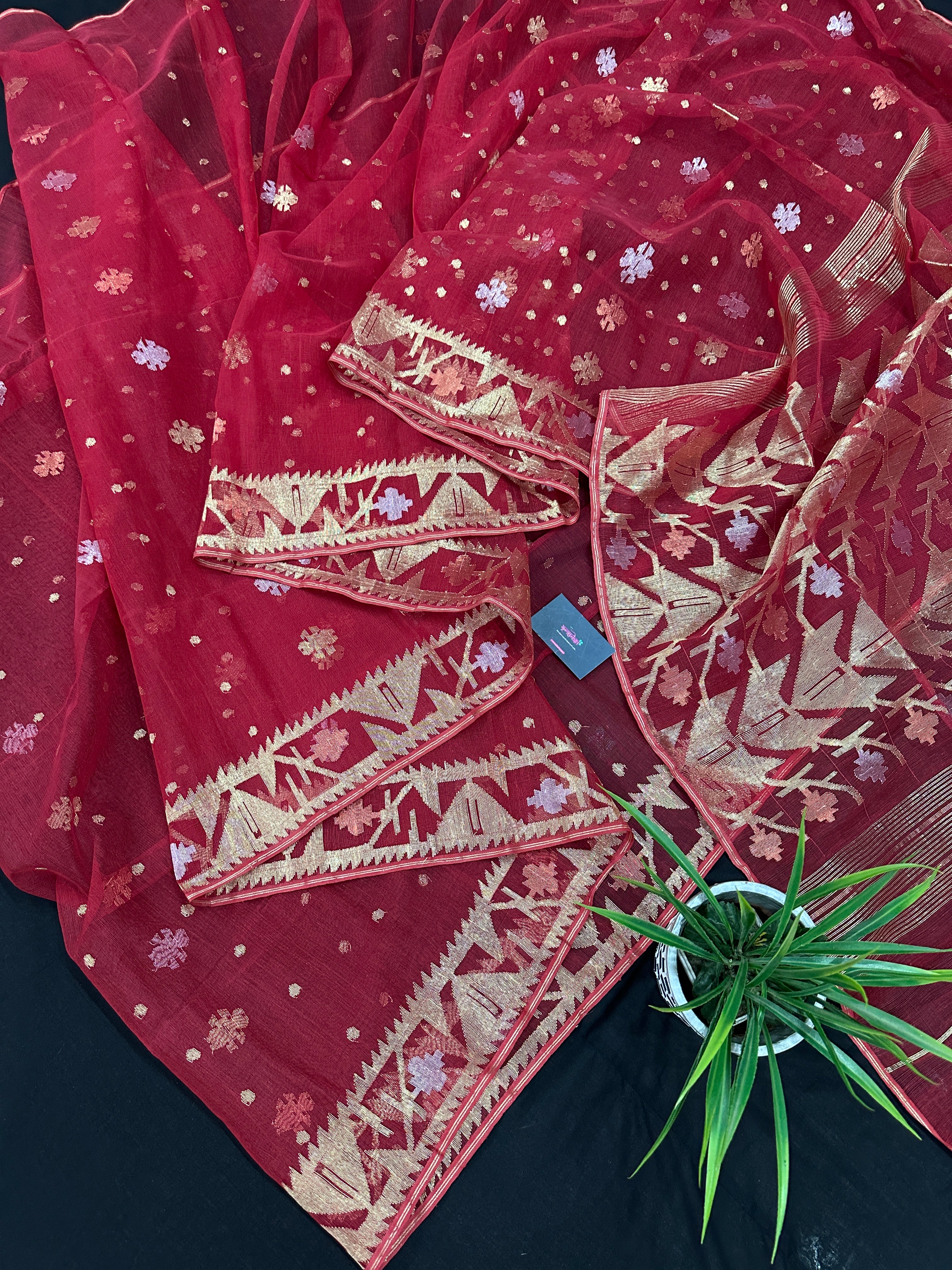 Red jamdani saree with golden jori all over work with blouse piece.