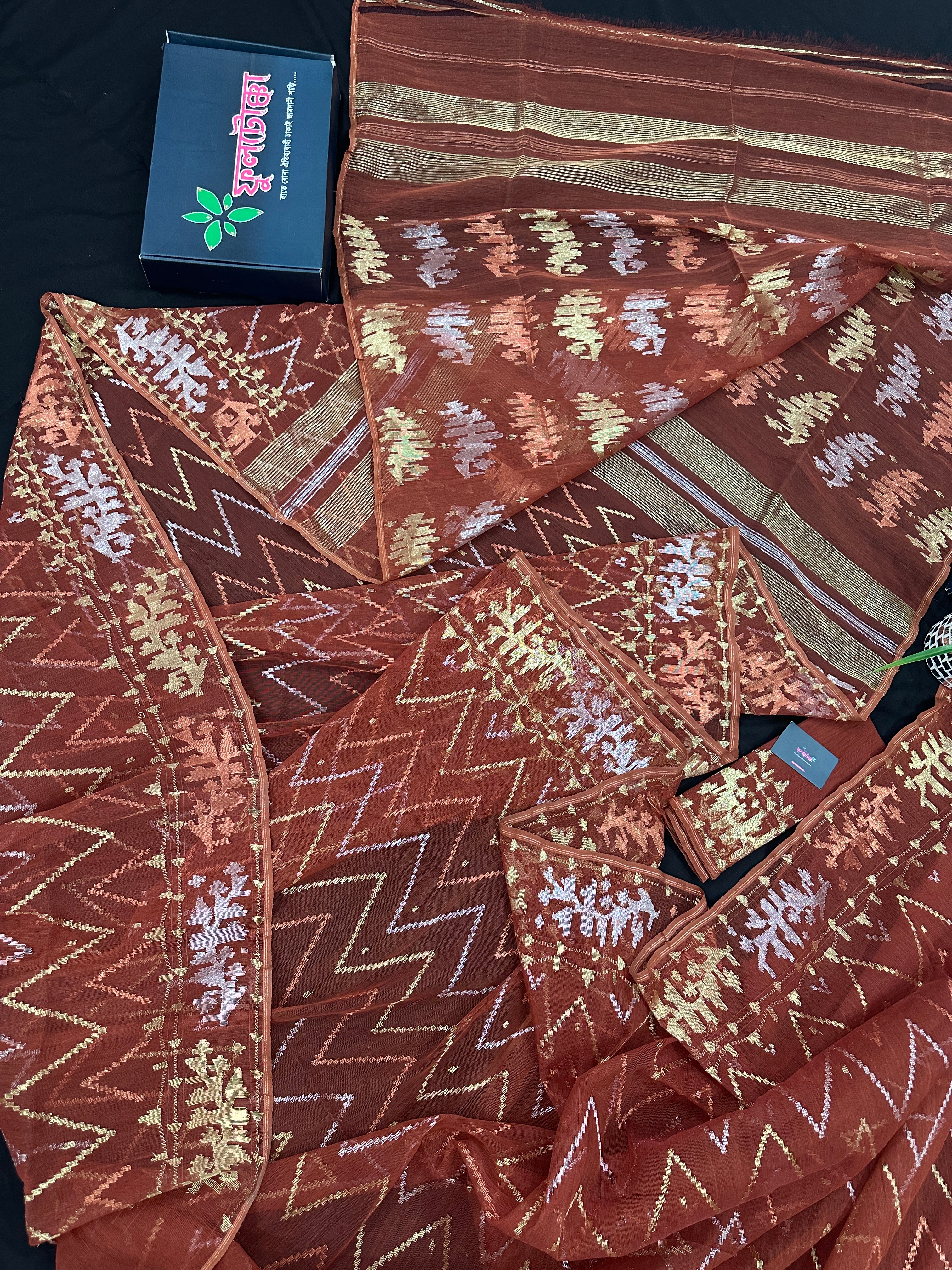 Brown reshom halfsilk jamdani saree with golden silver & copper jori work.