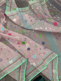 Baby pink jamdani saree with blue pink green threats work and blouse piece.