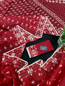 Maroon jamdani saree with white thread work.