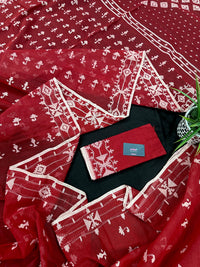 Maroon jamdani saree with white thread work.