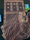 Brown colour jamdani saree with brown & off white threads work.