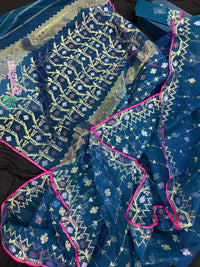 Peacock blue jamdani saree with golden silver copper jori work and pink border