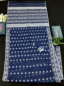 Deep blue jandani saree with white threads all over work.