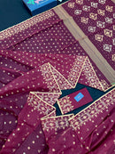 Maroon cotton jamdani with yellowish threads work.