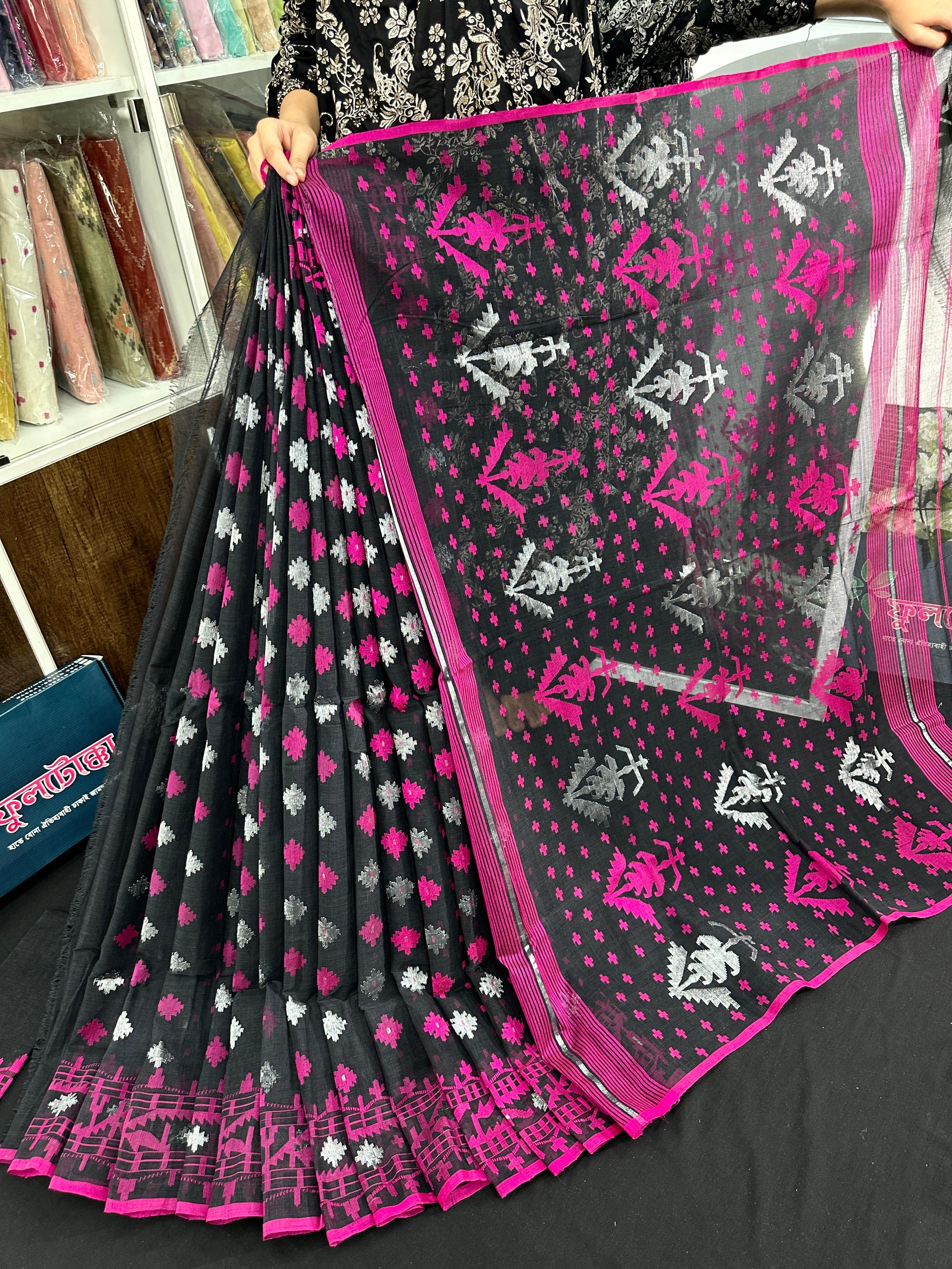 Black cotton jamdani saree with magenta threads work and silver jori work