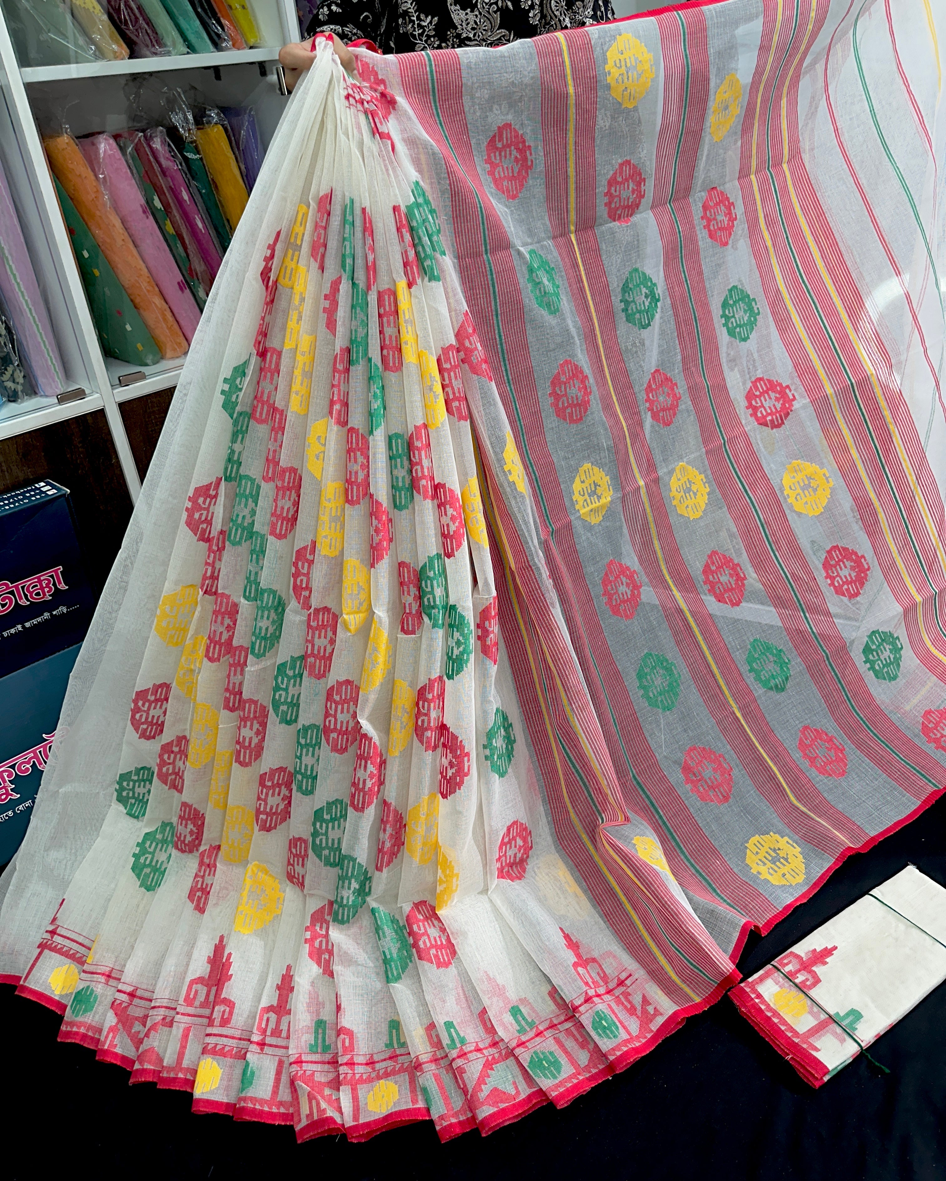 White cotton jamdani saree with red yellow green threads work multiple colour threads work