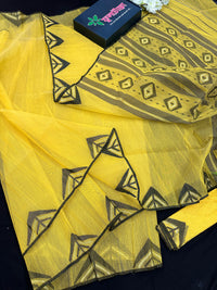 Yellow cotton jamdani sari with simple paar.