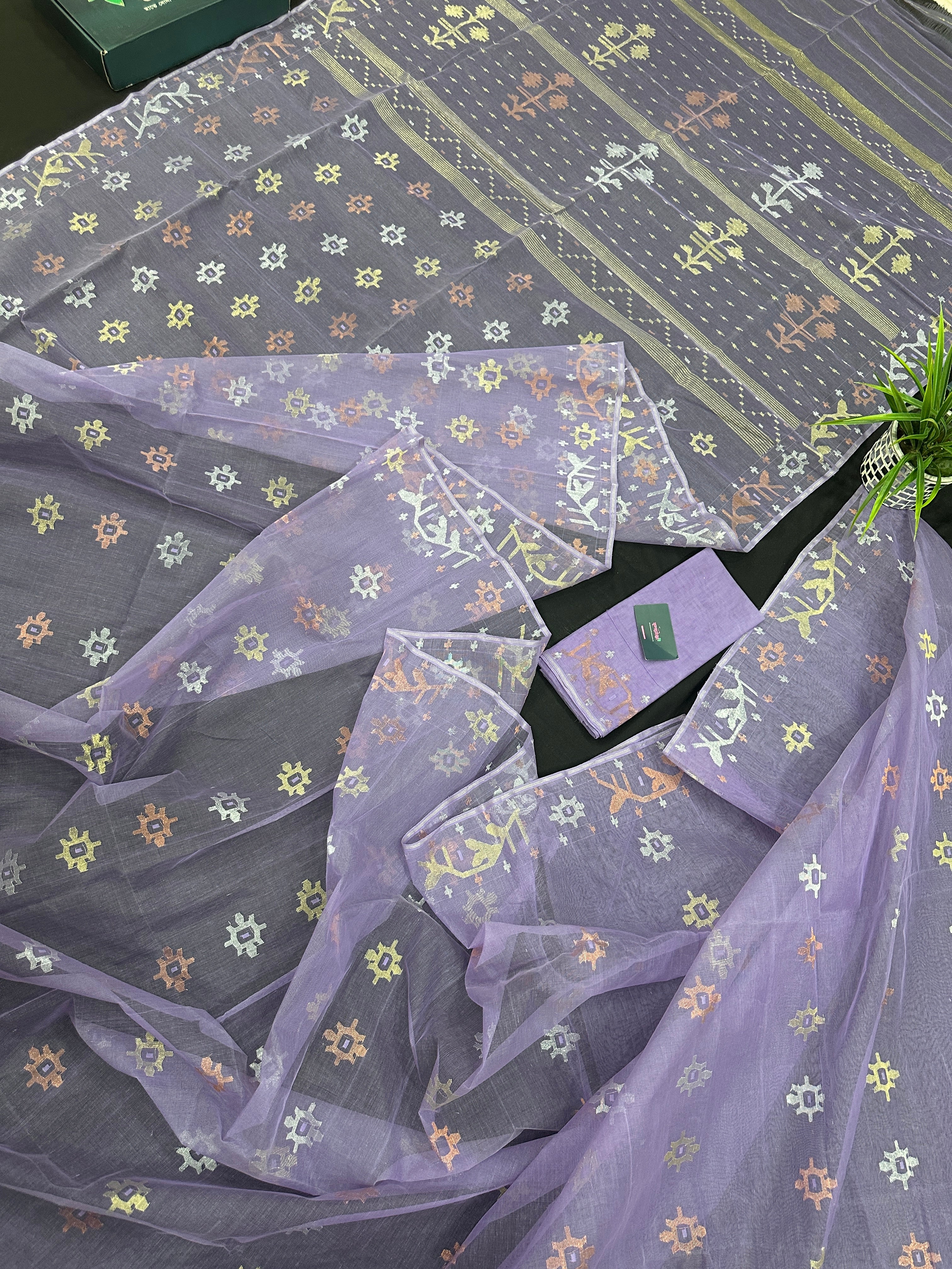 Lite lavender jamdani saree with golden silver copper jori work.