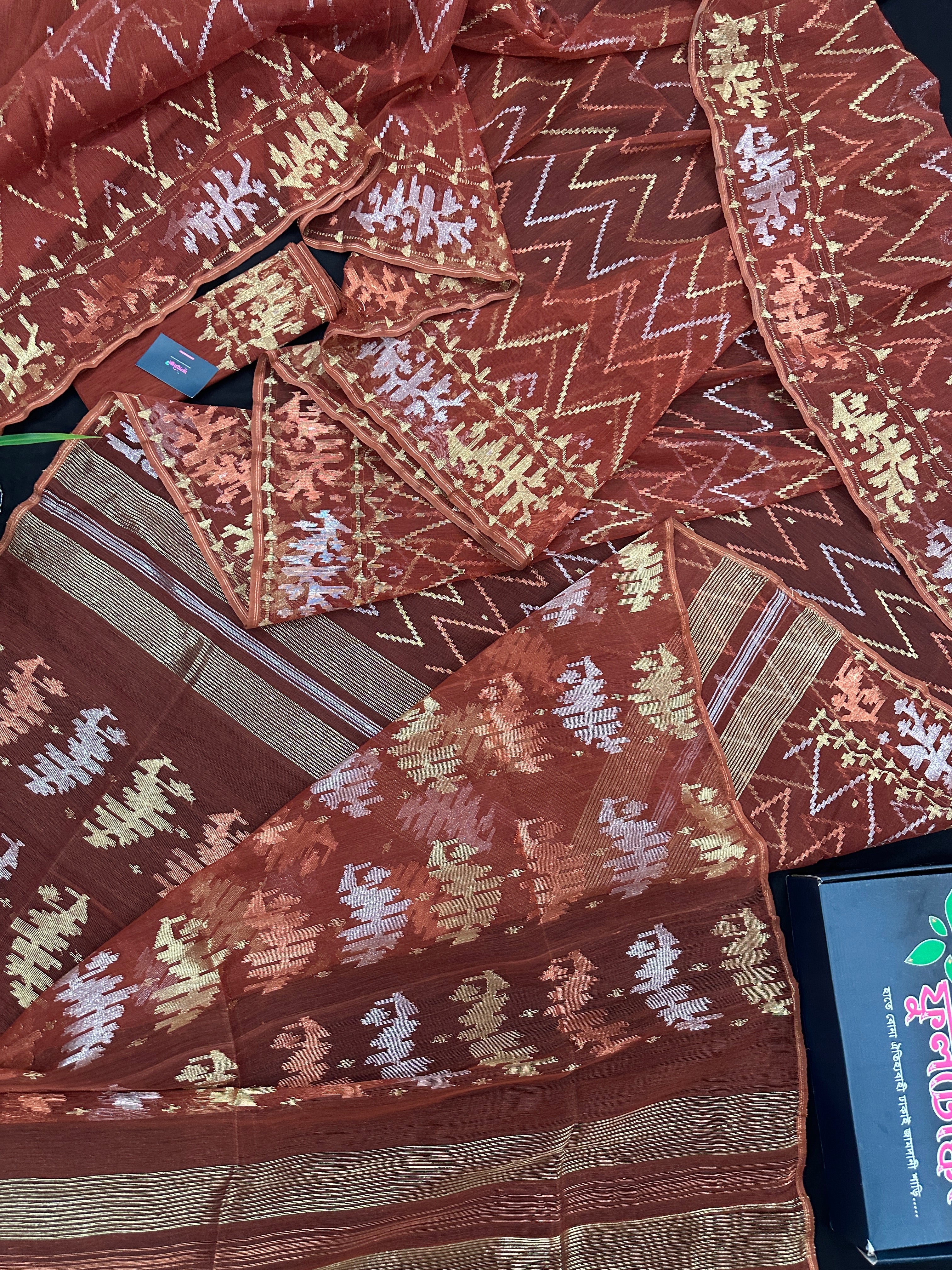 Brown reshom halfsilk jamdani saree with golden silver & copper jori work.