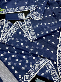 Deep blue jandani saree with white threads all over work.