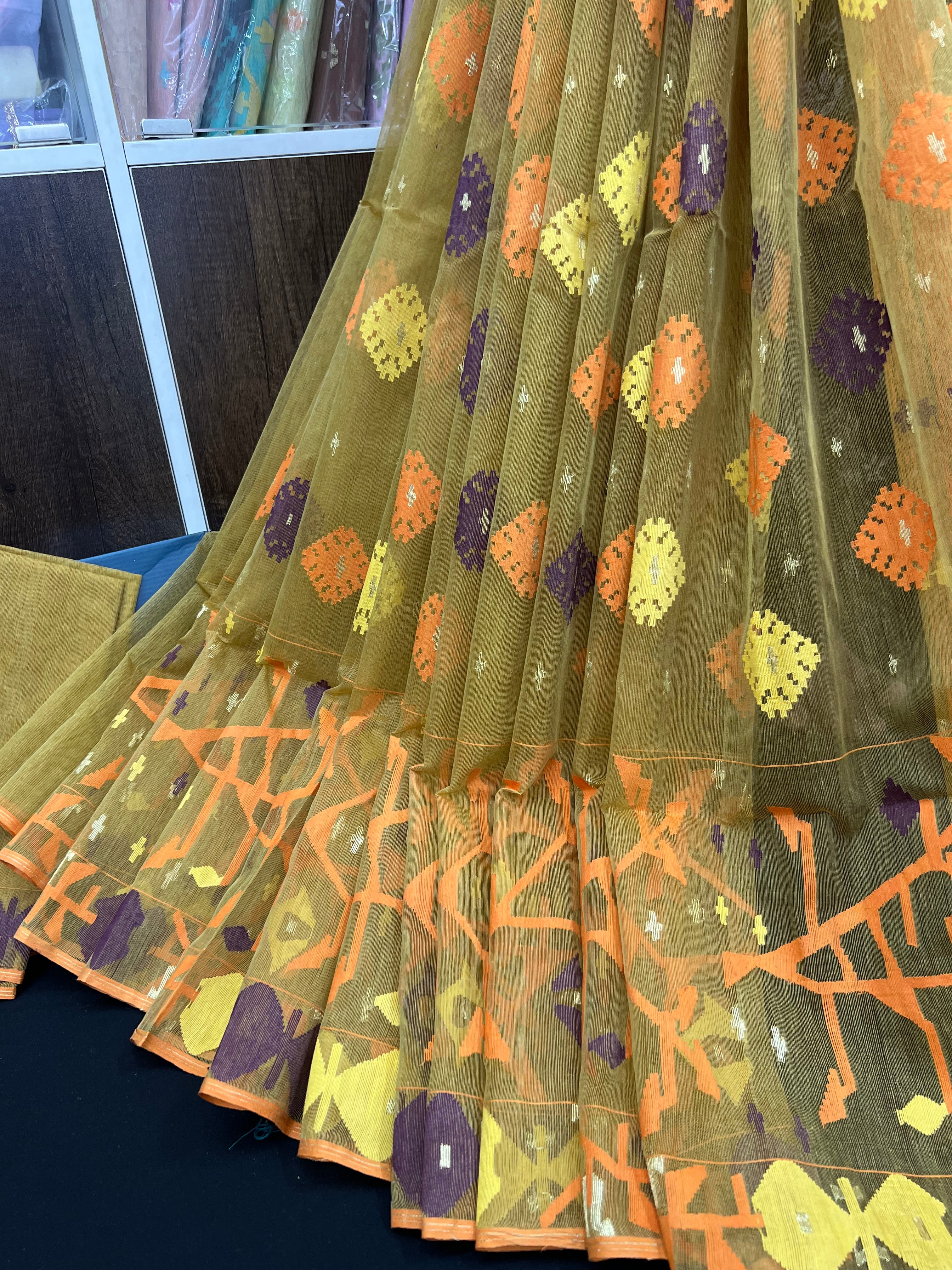 Olive exclusive halfsilk jamdani saree with yellow orange blue pink threads work