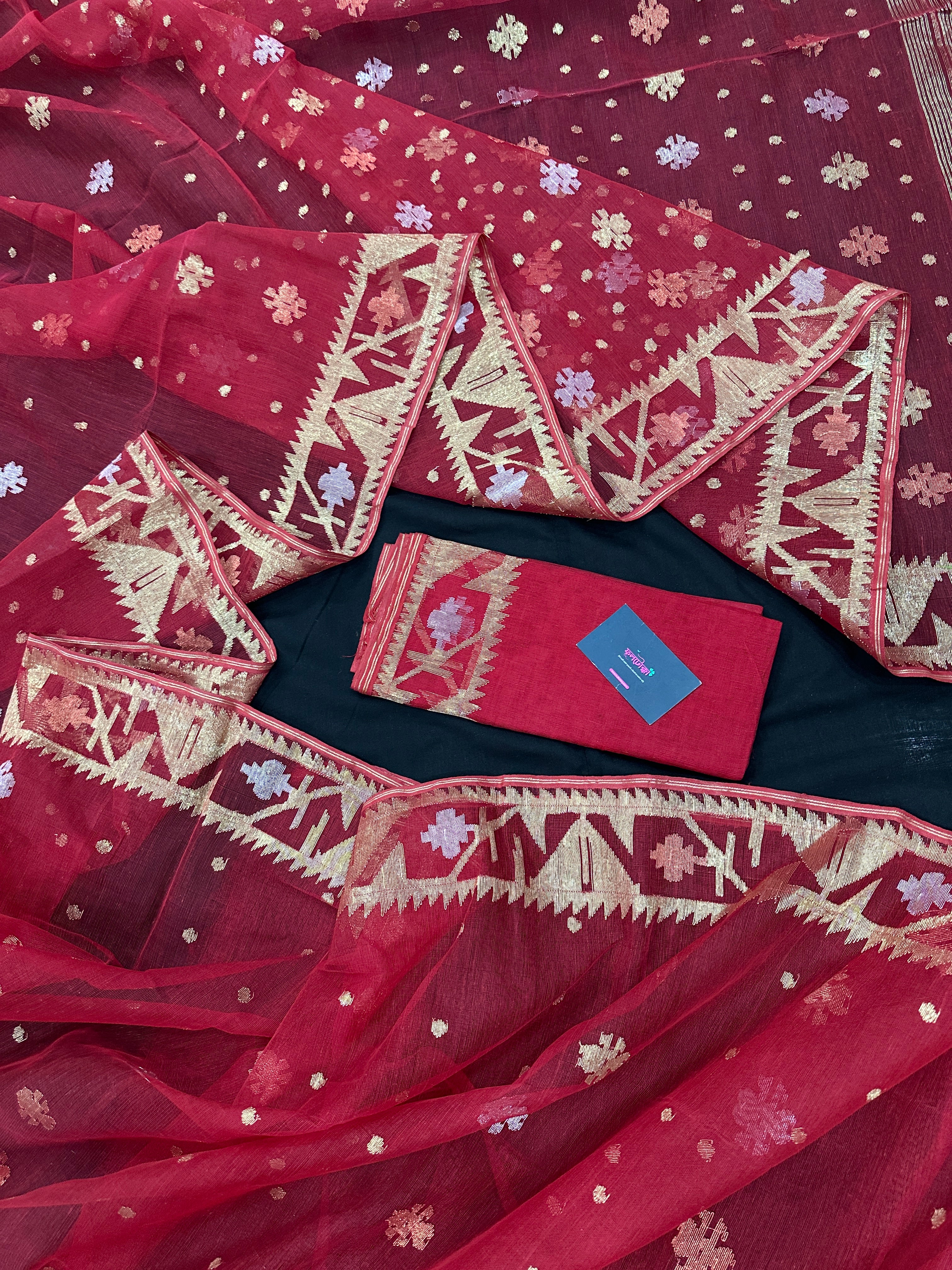 Red jamdani saree with golden jori all over work with blouse piece.