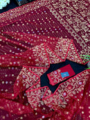 Reddish Maroon Bridal Exclusive dhakai jamdani saree with all over golden jori work soft count.