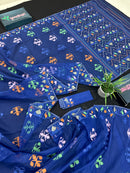 Royal blue jamdani saree with green pink blue orange threads work.
