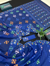 Royal blue jamdani saree with green pink blue orange threads work.