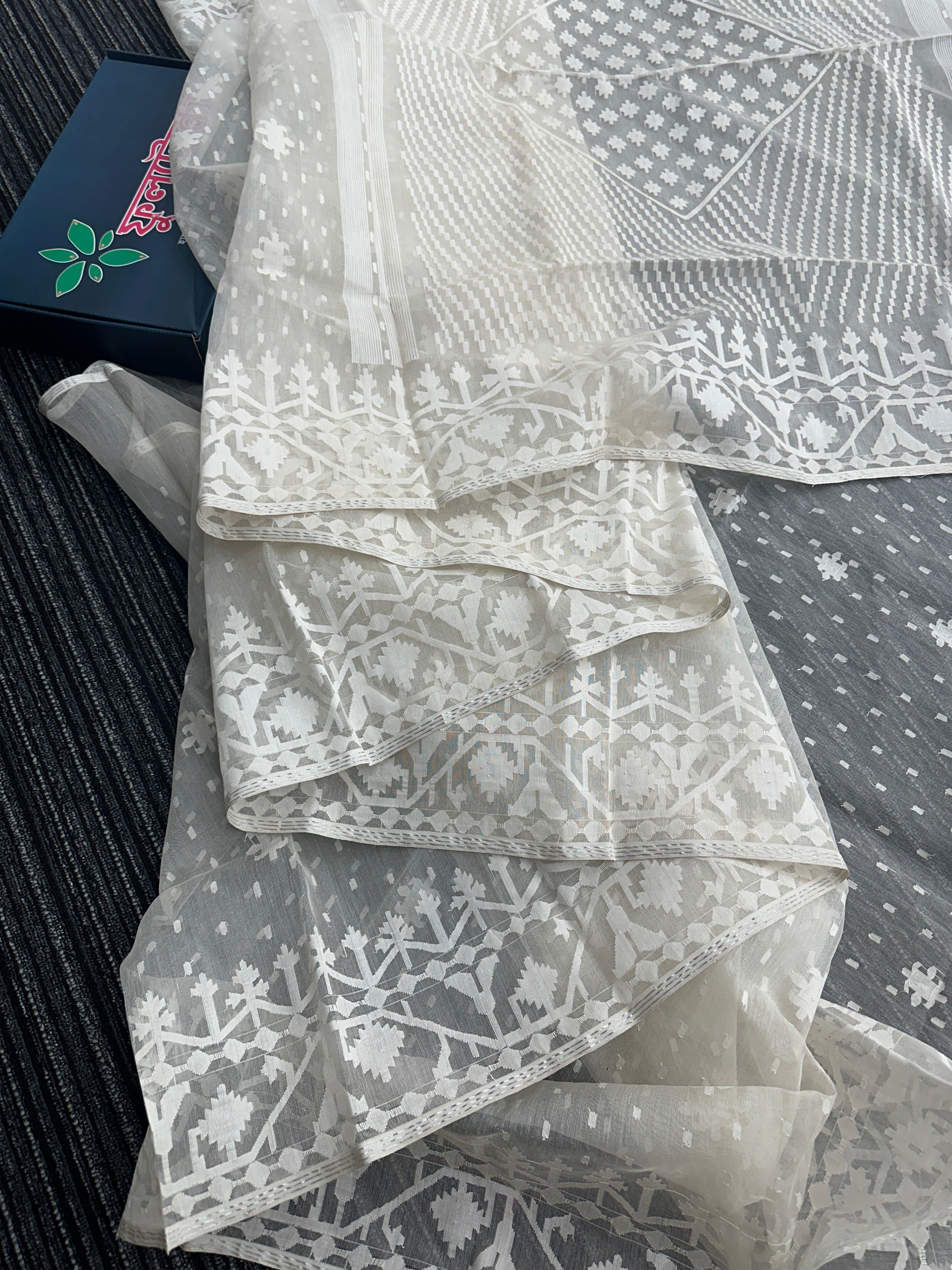 White exclusive halfsilk jamdani saree with white threads work and blouse piece