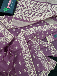 Onion cotton jamdani saree with yellowish threads work all over work.