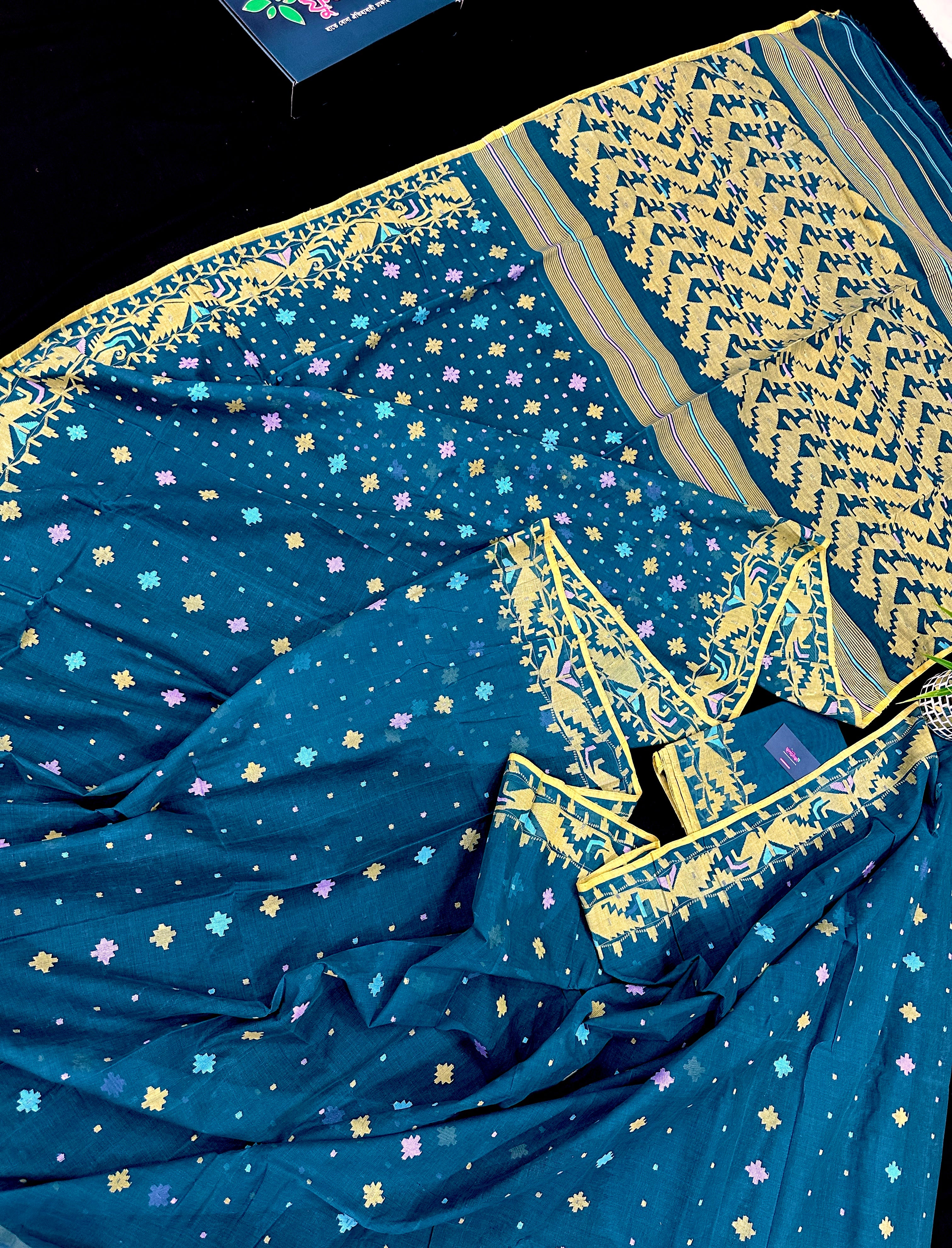 Peacock blue cotton jamdani saree with yellow threads work all over soft count