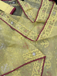 Pastel yellow dhakai jamdani saree with yellow threads silver & copper jori work all over work soft count.