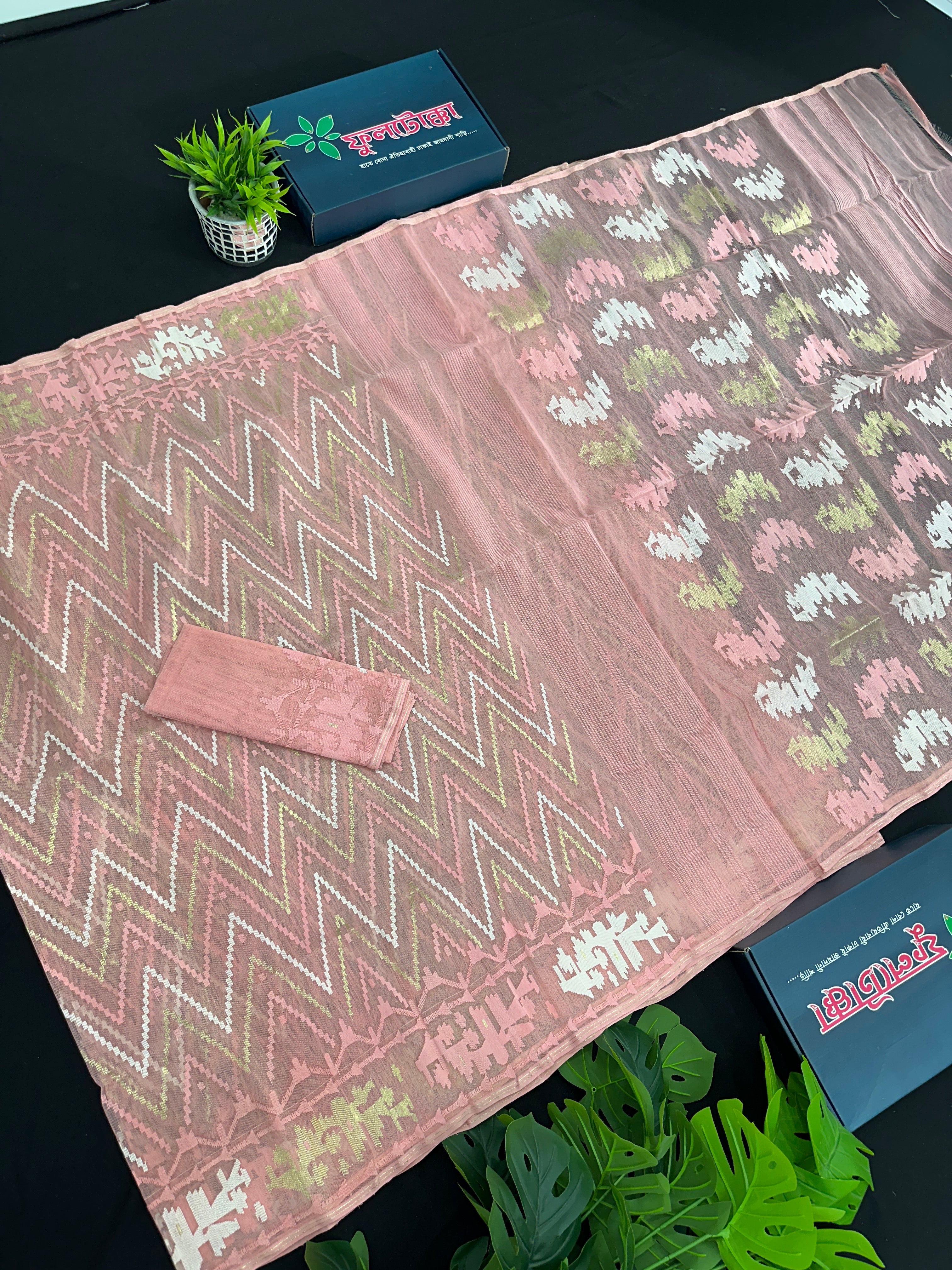 Blushing peach halfsilk jamdani saree with golden jori work and white threads work