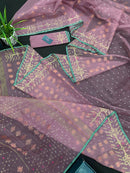 Onion colour jamdani saree with pink meena and green border.