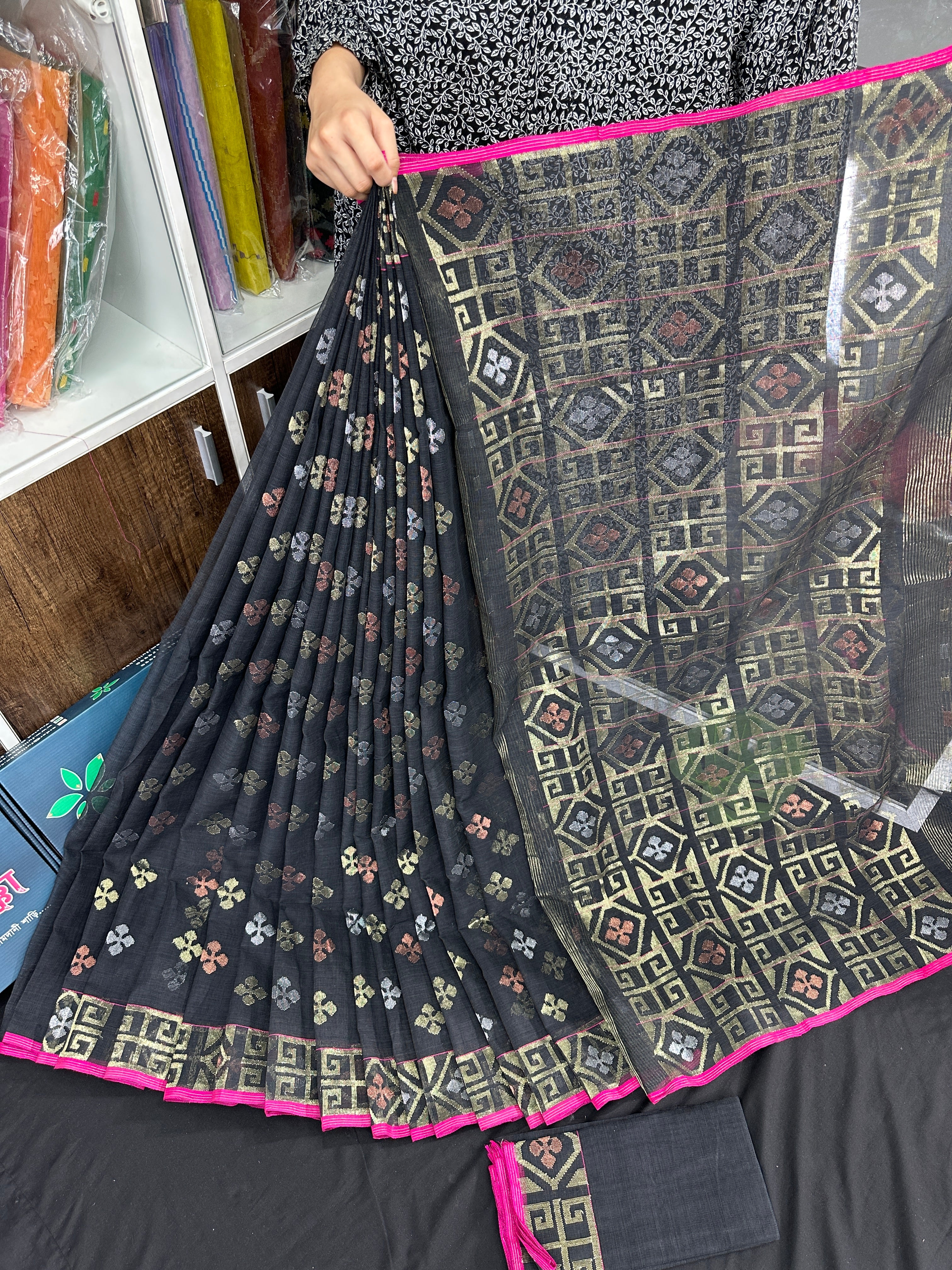 Black jamdani saree with golden silver and copper jori work and pink border
