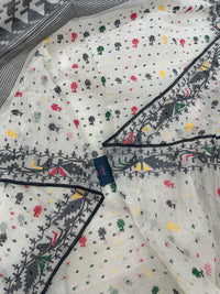 White cotton jamdani saree with black red yellow green threads work & blouse piece.