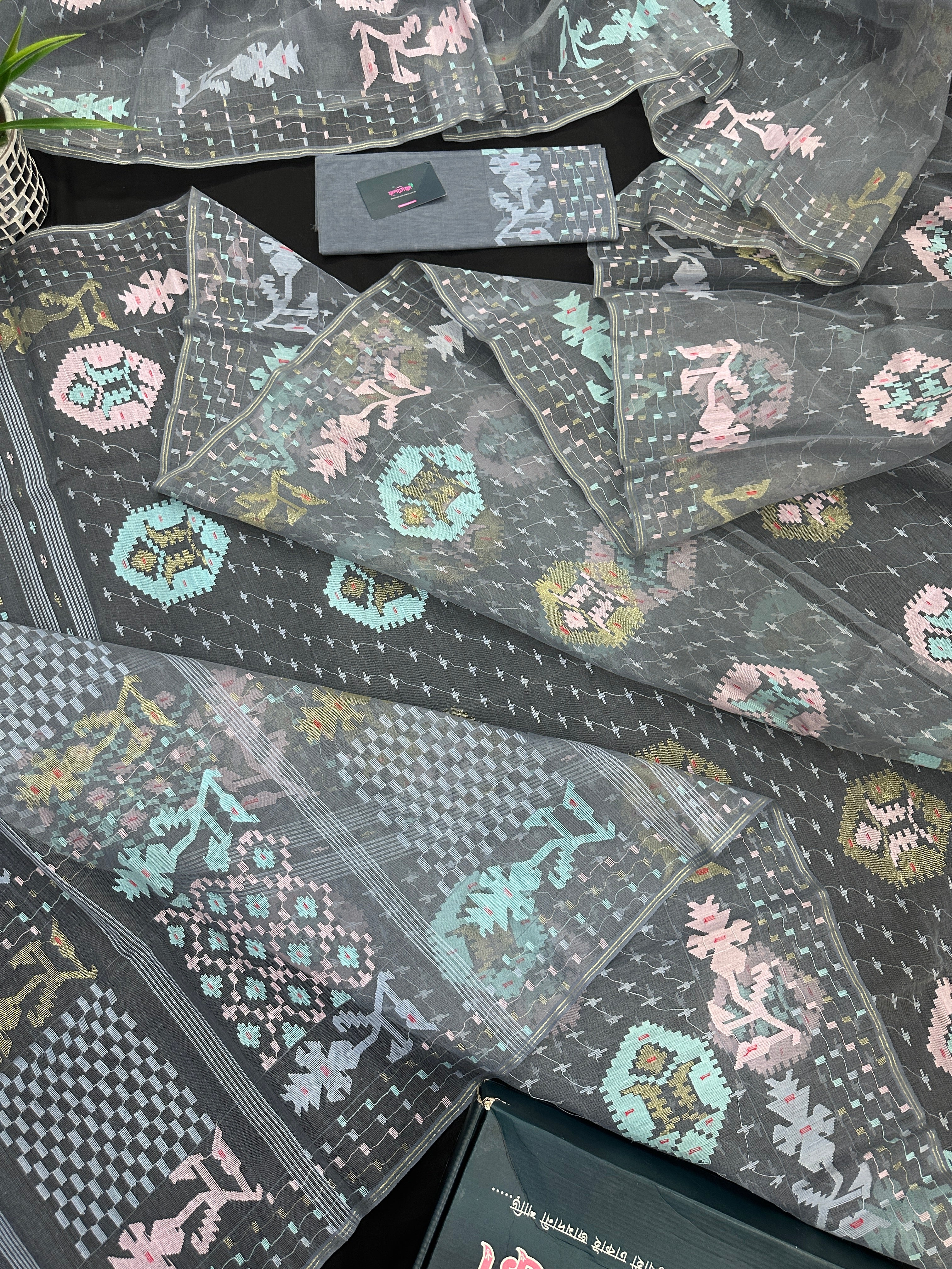 Ash jamdani saree with pink blue and with threads work and golden jori work.