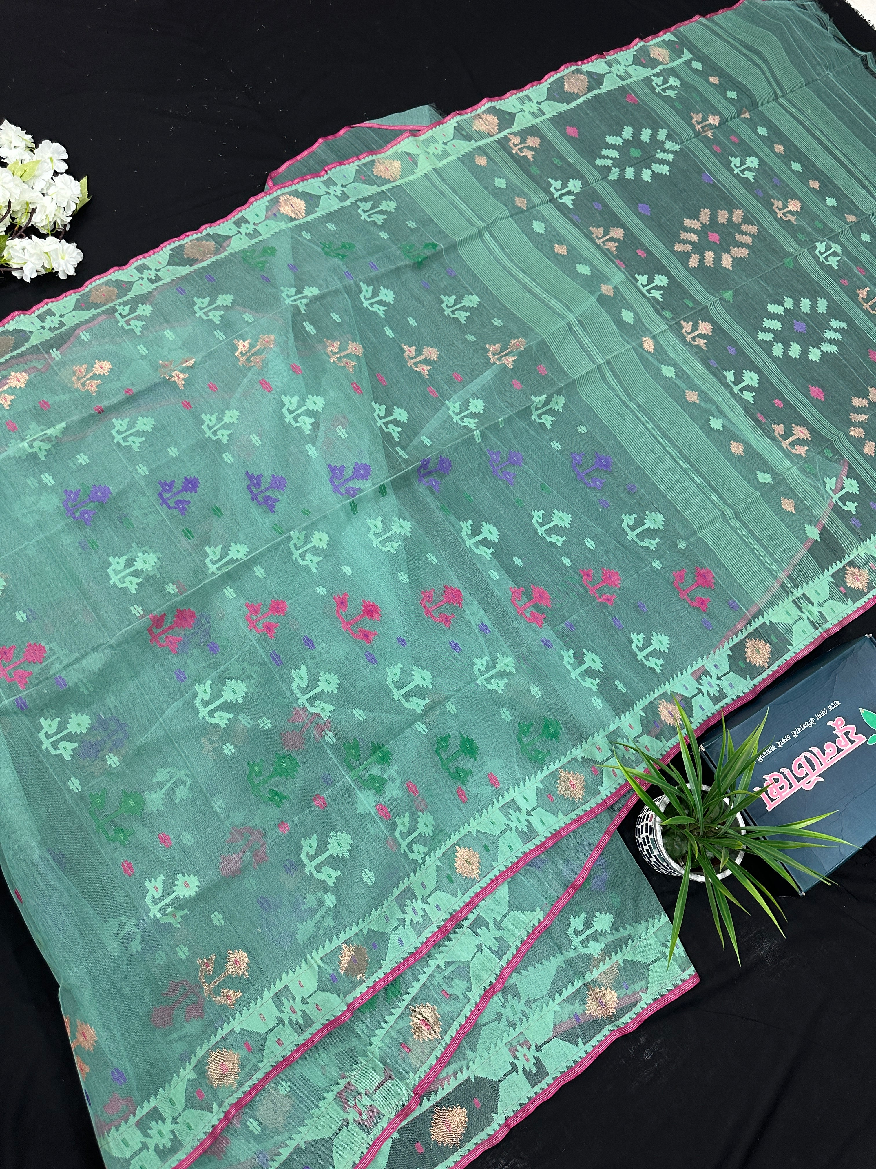 Bright Teal Blue dhakai Jamdani saree with pink border all over work soft count.